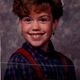 Illustration for article titled Goofy Glasses, Pretty Pigtails & Snaggletooth Smiles: September Is For School Portraits